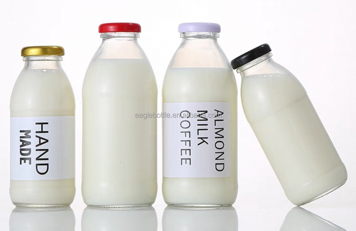 Milk Juice Glass Beverage Bottle with Screw Lids Glass Bottles Wholesale 16oz for Alcoholic Beverages