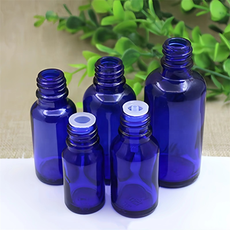 Blue Glass Essential Oil and Probiotics 5ml 10ml 20ml 50ml 100ml Bottles with Plastic Black Cap and  Oil Reducer