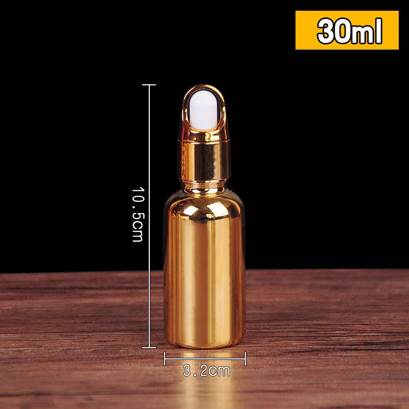 Luxury Cosmetic Packaging Essential Oil Small Round Empty Shiny Silver Gold Dropper Oil Bottle With Unique Flower Basket Rubber