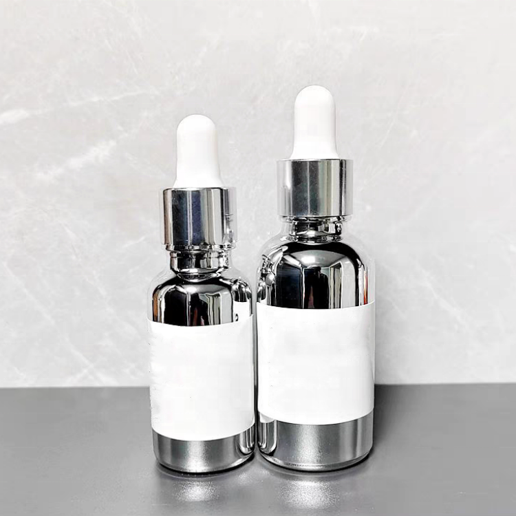 Wholesale Uv Protection Gold or Silver Glass Bottle With Dropper Screw Cap Hot Stamped for Essential Oil and Cosmetic Liquids