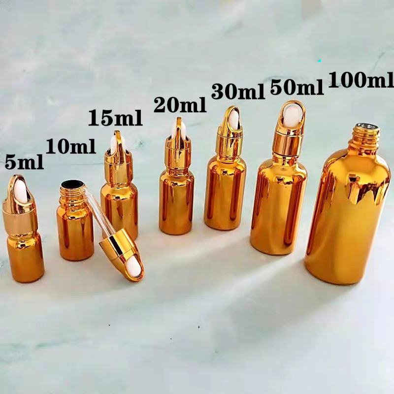 Luxury Cosmetic Packaging Essential Oil Small Round Empty Shiny Silver Gold Dropper Oil Bottle With Unique Flower Basket Rubber