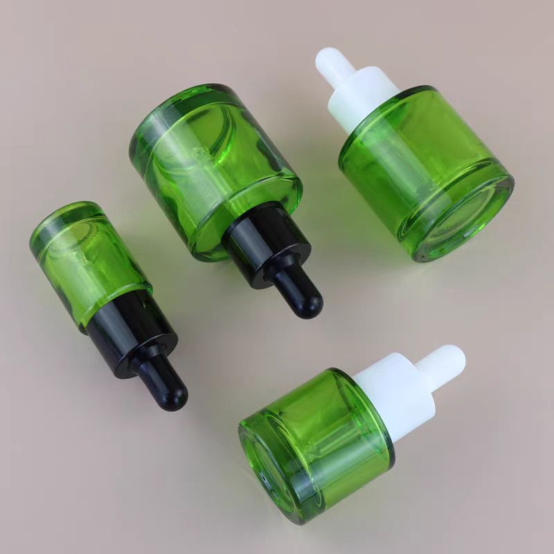Custom Color 30 ml 1oz  Empty Essential Oil Bottle Round Glass Hair Oil Dropper Bottles With Plastic Dropper Lids