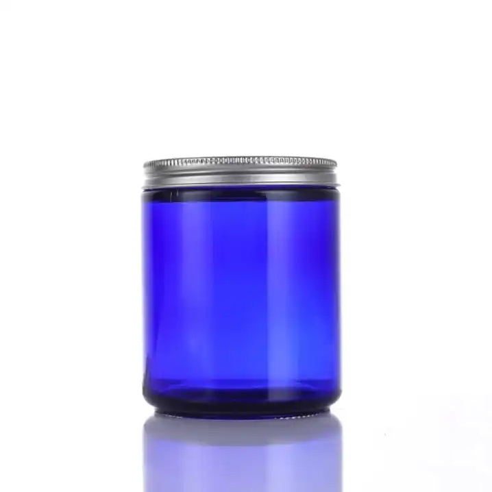 Luxury 4oz Amber Blue Glass Candle Jar With Lid Elegant Cylindrical Container for Home Festivals Bulk Packed Customized Logo