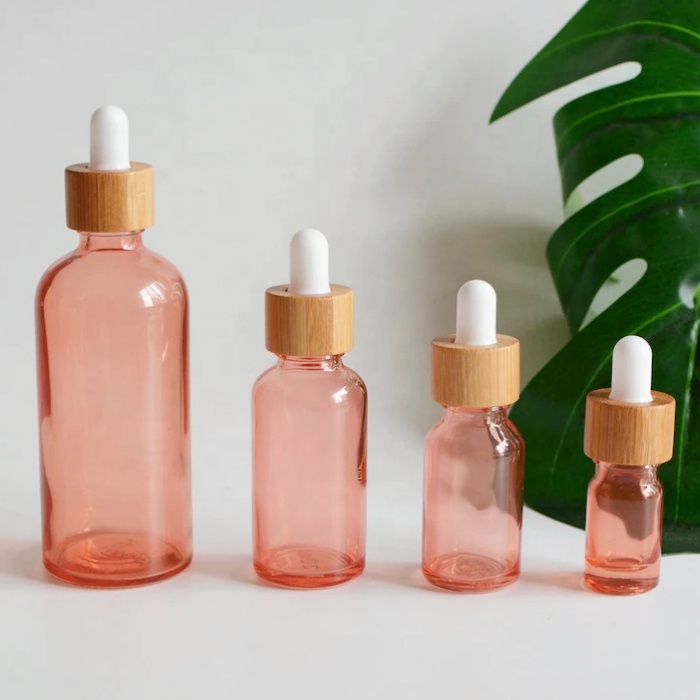 Manufacturer Round Glass Bottle 1 Oz Pink Glass Bottle 15 20 50 Ml Dropper Glass Bottle With Bamboo Cap for Cosmetic Packaging