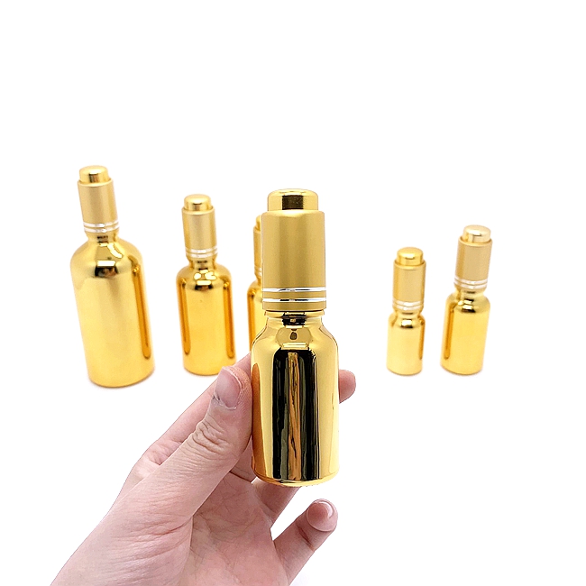 Manufacturer Fancy Gold Glass Cosmetic Oil Serum Dropper Bottle Empty Cylinder Shape Refillable Perfume Use Facial Cleanser Wigs