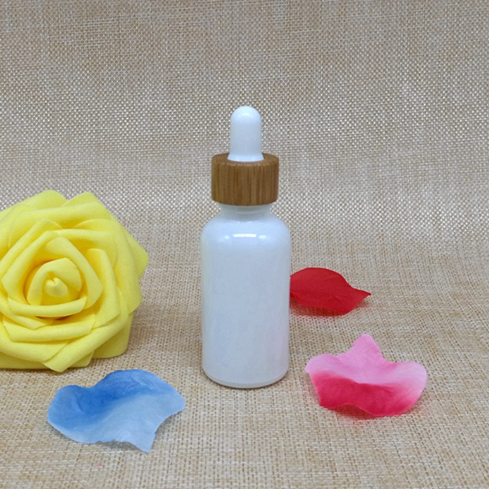 Factory Wholesale White Glass Essential Oil Bottle 10ml 30ml 50ml 100ml Porcelain White Glass Bottle With Dropper
