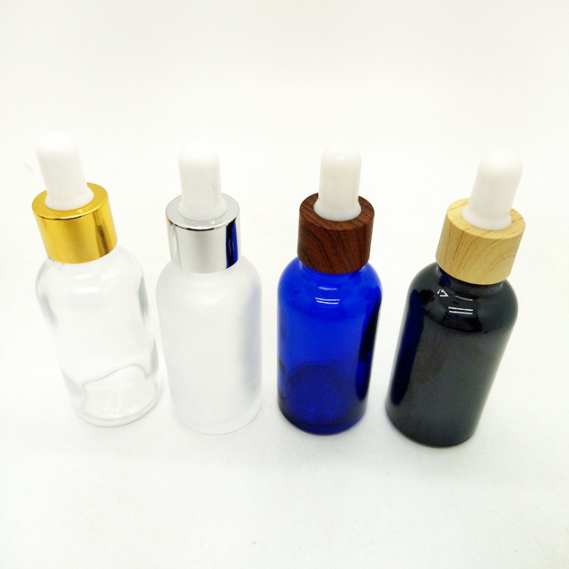 Best Selling 30ml Black Frosted Cosmetic Bottle Essential Oil Bottle With Measurement Pipette and Paper Tube Packaging Glass Bottle