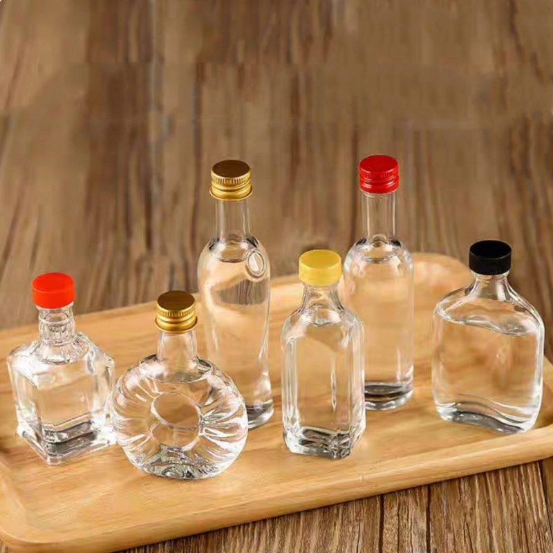 Premium Round Shaped 50ml Mini Liquor Glass Bottle Empty Alcohol Brandy Whisky Glass Bottle With Seal Closure