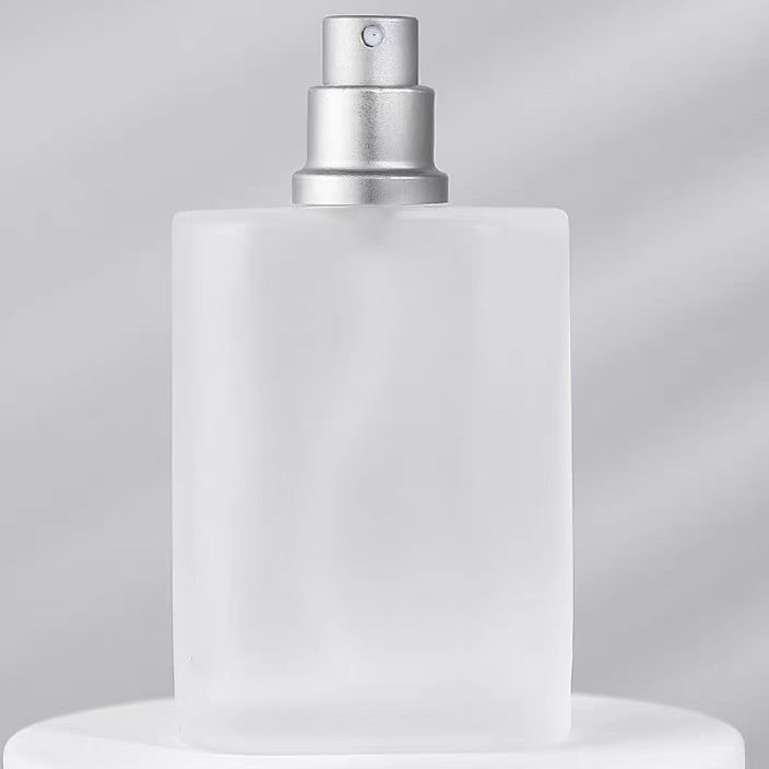 Wholesale Pump Sprayer Glass Bottle 30ml50ml100ml Flat Frosted Clear Glass Perfume Bottles With Metal Cap
