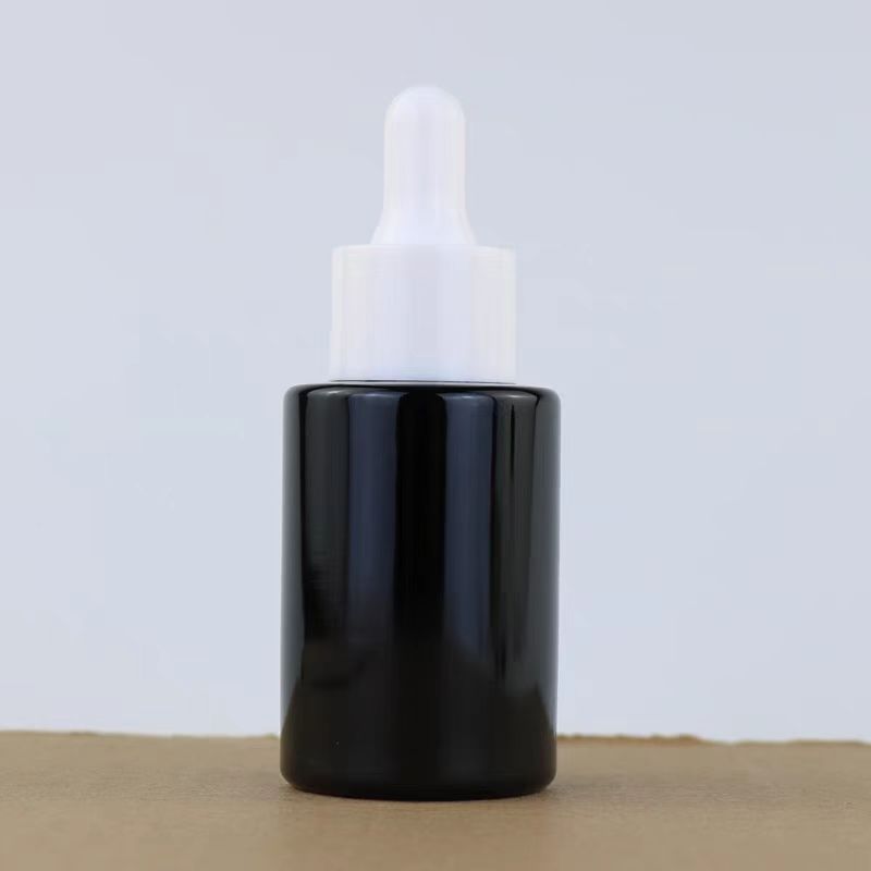Custom Black Skincare Oil Bottle Empty 20ml 30ml 50ml Cylinder Luxury Cosmetic Hair Glass Dropper Serum Bottle 20 ml