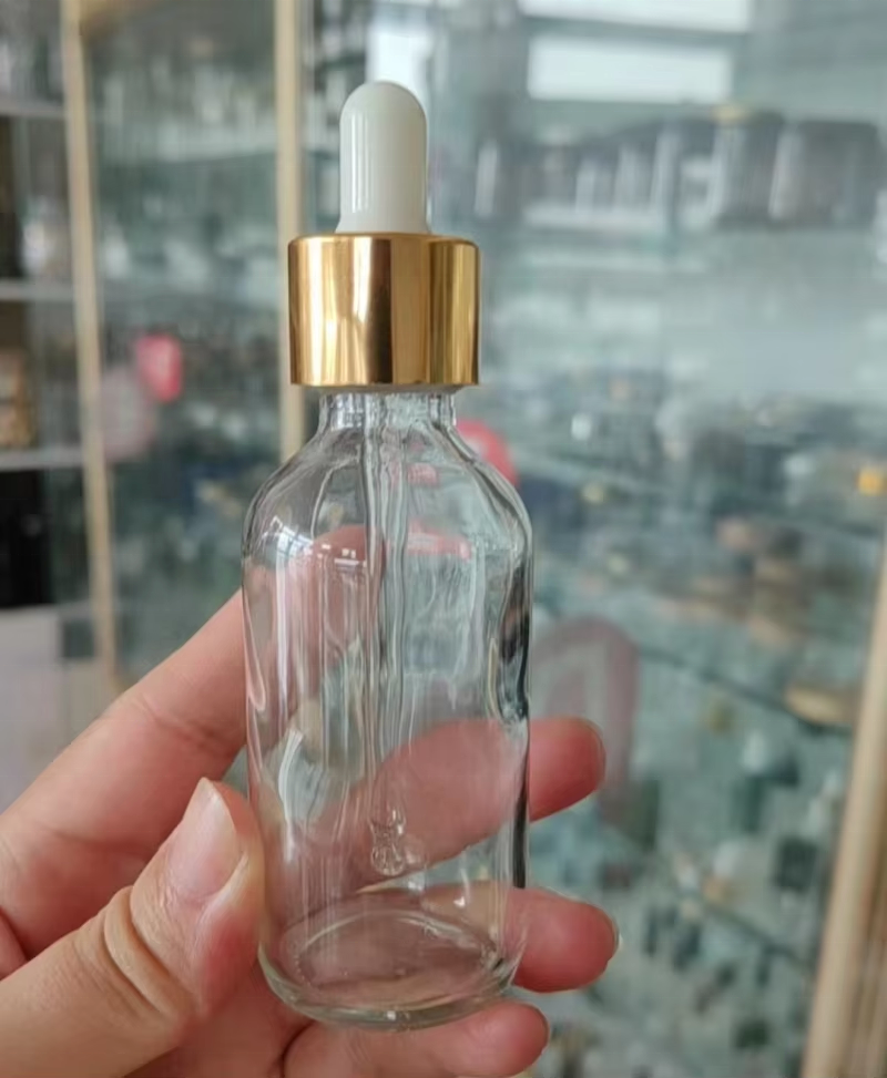 Empty Round  1 Oz 2 Oz Gold Clear Cosmetic Essential Oil Serum Transparent Glass Dropper Bottle