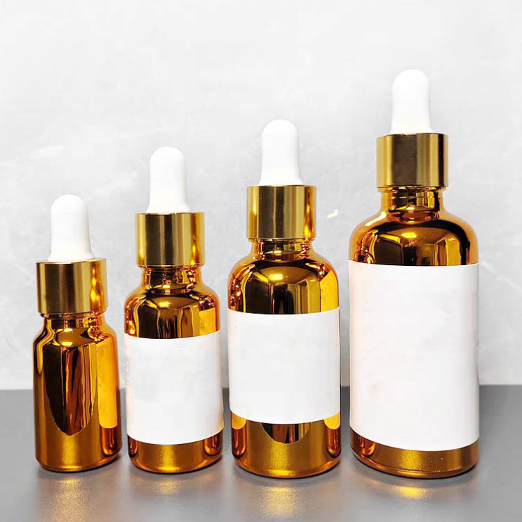 Wholesale Uv Protection Gold or Silver Glass Bottle With Dropper Screw Cap Hot Stamped for Essential Oil and Cosmetic Liquids