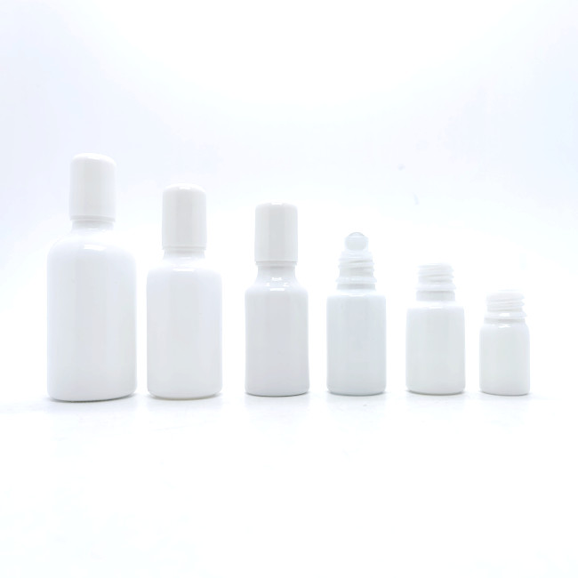Factory Wholesale White Glass Essential Oil Bottle 10ml 30ml 50ml 100ml Porcelain White Glass Bottle With Dropper