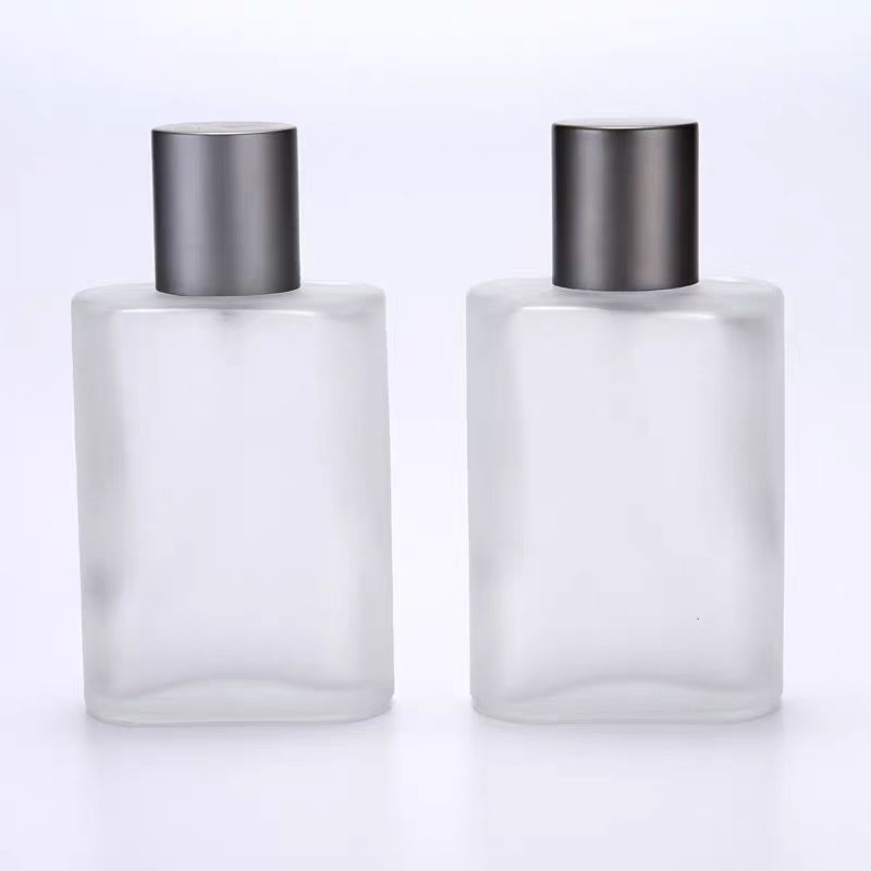 Wholesale Pump Sprayer Glass Bottle 30ml50ml100ml Flat Frosted Clear Glass Perfume Bottles With Metal Cap